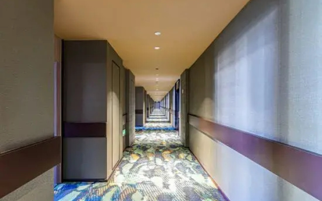 Orange Hotel (Xishuangbanna Jinghong Menglong Dafosi Branch)