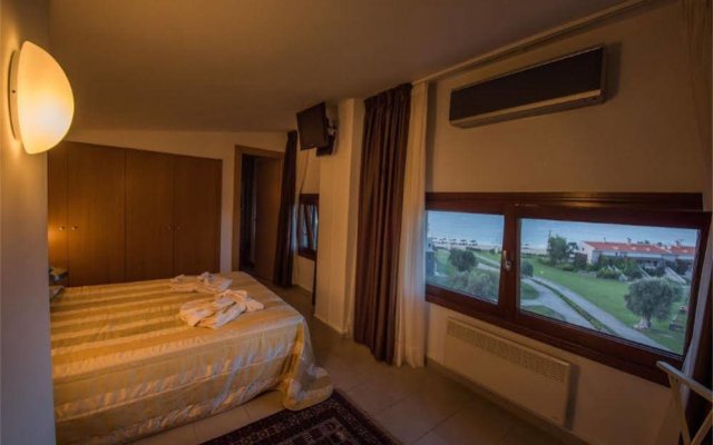 Отель Athos Villas Греция, Ормос-Панагиас - отзывы, цены и фото номеров - забронировать отель Athos Villas онлайн комната для гостей