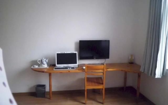 Sanhe Jieshen Business Hotel