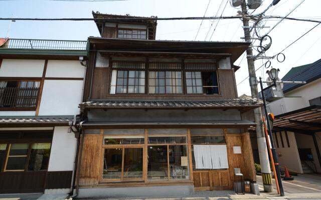 Taketa station hostel cue Минамиогуни вид на фасад