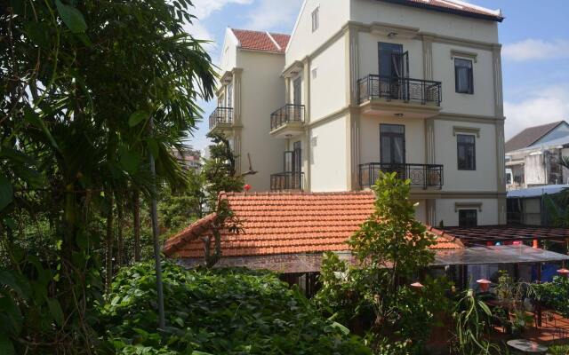 Отель Botanic Garden Villas вид на фасад