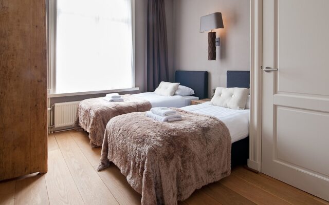 Апартаменты Leidsesquare Apartments комната для гостей