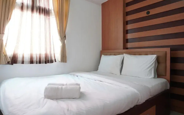 Homey and Warm 2BR Green Pramuka Apartment