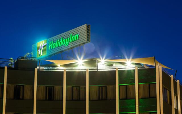 Отель Holiday Inn Lisbon вид на фасад