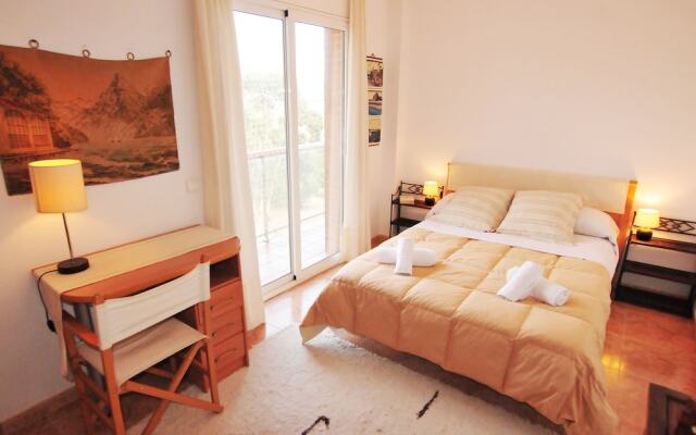 Отель HomeHolidaysRentals Apartamento Light - Costa Barcelona Испания, Мальграт-де-Мар - отзывы, цены и фото номеров - забронировать отель HomeHolidaysRentals Apartamento Light - Costa Barcelona онлайн комната для гостей