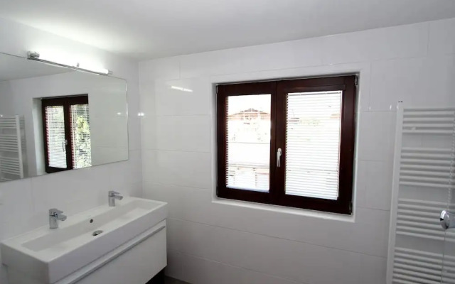 Quaint Chalet in Kirchberg with Terrace, Garden, Ski Storage