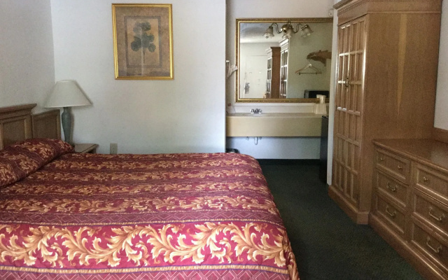 Apm Inn and Suite