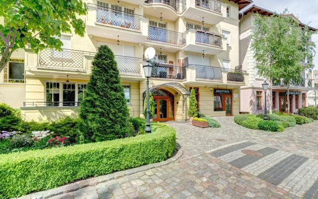 Апартаменты Dom & House - Apartments Patio Mare вид на фасад