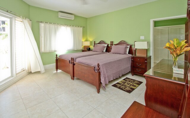 Отель Azure Cove, Silver Sands. Jamaica Villas 5BR комната для гостей