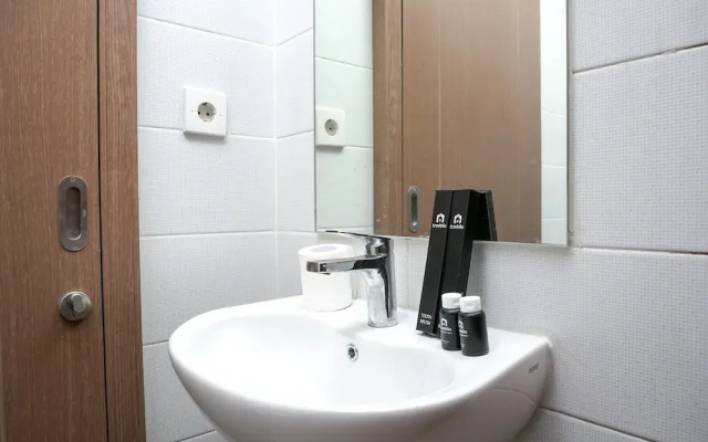 Cozy 1BR at Puri Orchard Apartment