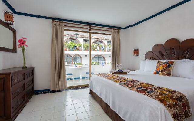Отель Los Arcos Suites Пуэрто-Вальярта комната для гостей