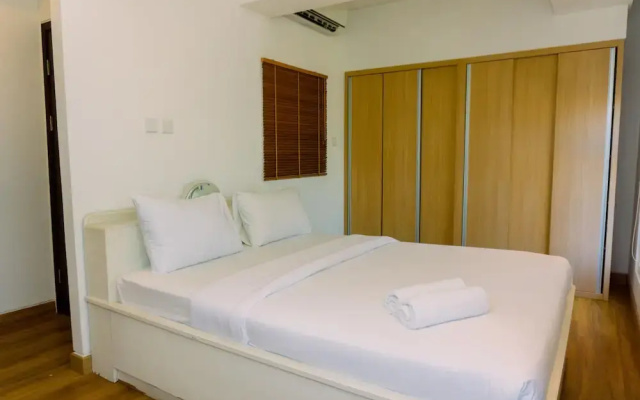 Spacious 1BR with Japandi Design at West Vista Apartment By Travelio