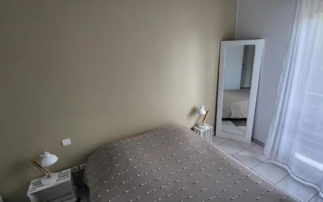 Appartement 2 chambres Balcon Parking privé Centre Village