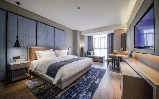 Xingyi Chain Hotel Jiangxia Metro Station