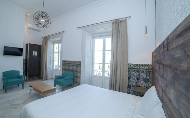 La Casa Amarilla Rooms & Suites