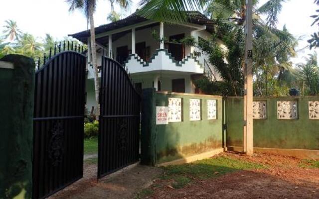 Отель Sheen Home stay Шри-Ланка, Пляж Golden Mile - отзывы, цены и фото номеров - забронировать отель Sheen Home stay онлайн вид на фасад