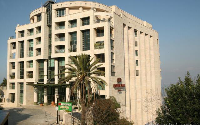 Отель Crowne Plaza Haifa Хайфа вид на фасад