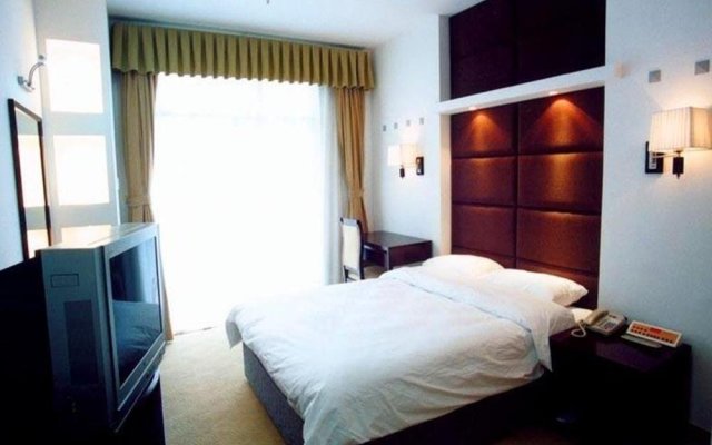 Отель Zhuhai Jinghuayuan Hotel Китай, Чжухай - отзывы, цены и фото номеров - забронировать отель Zhuhai Jinghuayuan Hotel онлайн комната для гостей