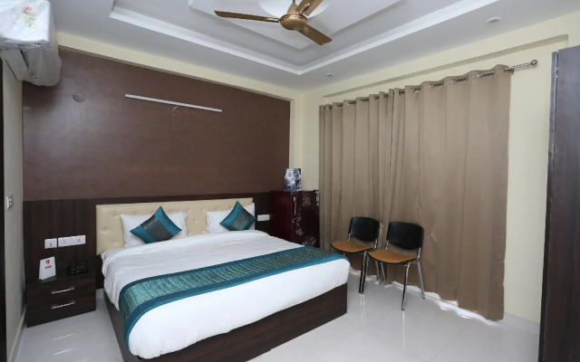 OYO Flagship 12081 Palm Garden Suites