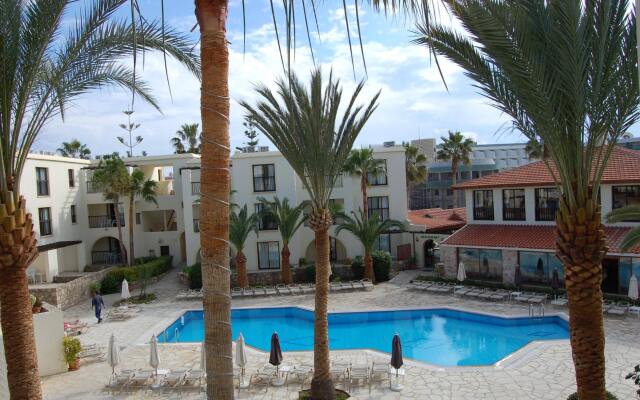 Отель Panareti Paphos Resort Кипр, Пафос - отзывы, цены и фото номеров - забронировать отель Panareti Paphos Resort онлайн вид на фасад