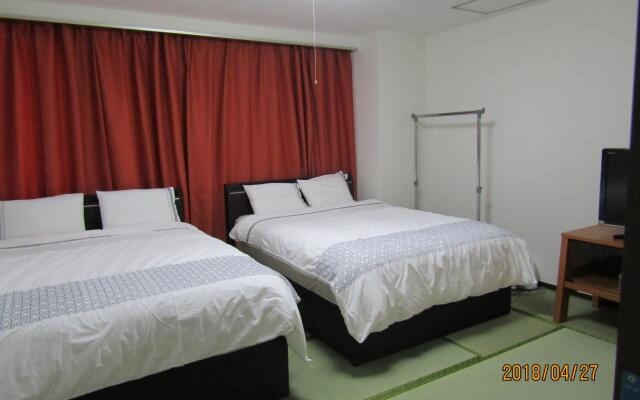 Guesthouse Chiharu - Hostel Фукуока комната для гостей