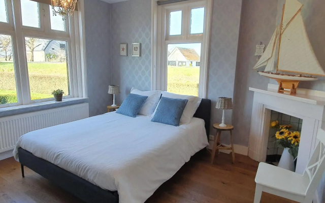 Spacious Farmhouse in IJzendijke with Garden