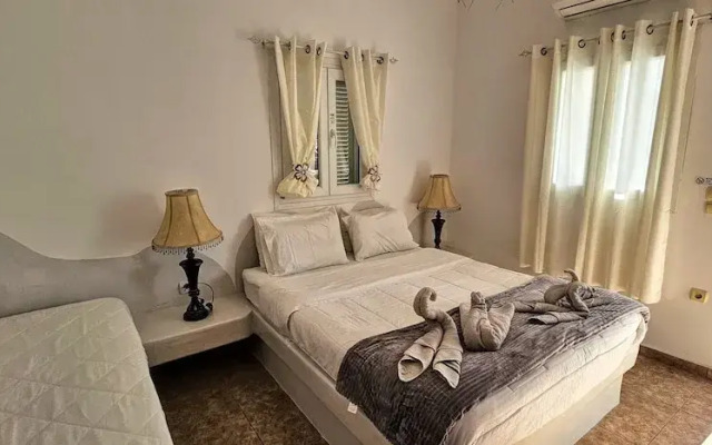 Santorini Studios Pleasure By The Sea