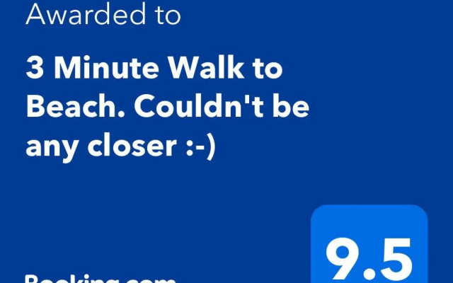 3 Minute Walk to Beach. Couldn't be any closer :-)