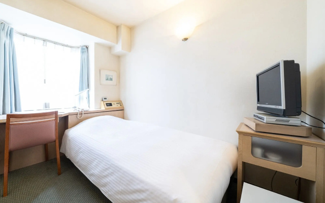 Отель Sunlite Shinjuku