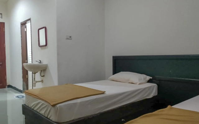 Palu City Guest House RedPartner