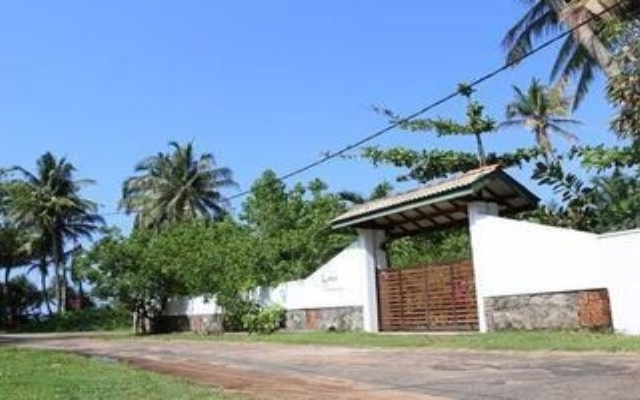 Отель Lohas Beach Resort Villa вид на фасад