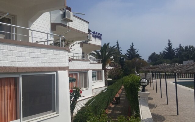 Altinkum Tatil Koyu Турция, Силифке - отзывы, цены и фото номеров - забронировать отель Altinkum Tatil Koyu онлайн вид на фасад