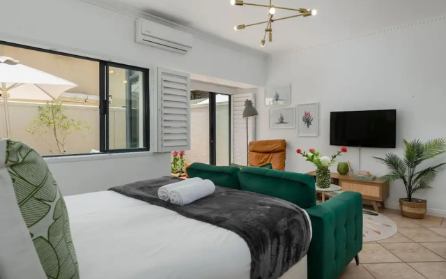 Stylish Sea Point Studio in Secure Complex Patio