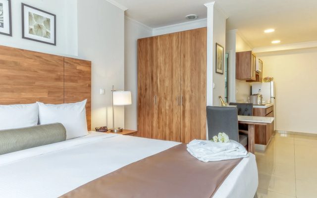 Отель Majestic City Suites & Beach