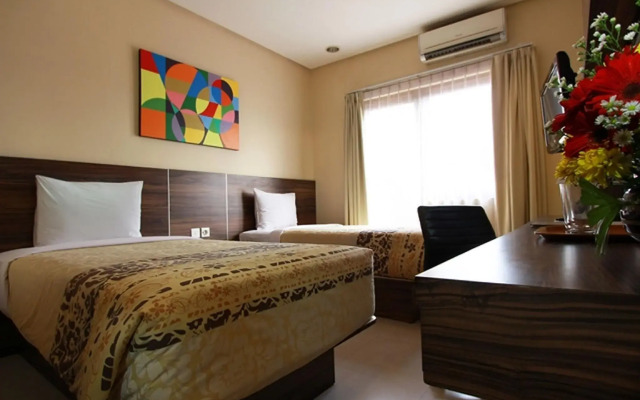 Capital O 203 Prasada Mansion Sudirman