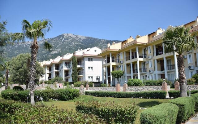 Pinara Apartments 9 Турция, Олудениз - отзывы, цены и фото номеров - забронировать отель Pinara Apartments 9 онлайн вид на фасад
