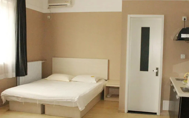 Xinde Apartment & Hotel