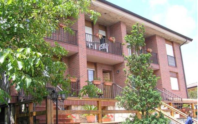 Отель Apartamentos Los Anades Испания, Арнуэро - отзывы, цены и фото номеров - забронировать отель Apartamentos Los Anades онлайн вид на фасад
