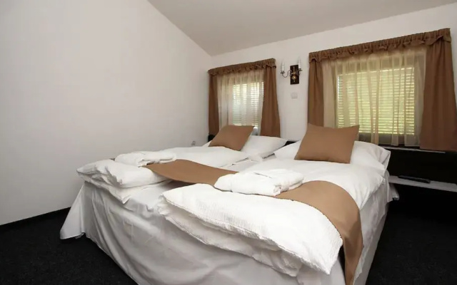 Timpa Apartmanház & Dr. Strecker Villa