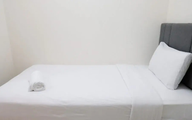 Homey 2Br At Puncak Permai Apartment