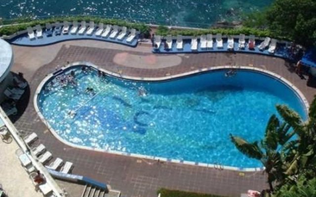 Отель Caleta Beach Resort Fishing & Diving Club Мексика, Акапулько - отзывы, цены и фото номеров - забронировать отель Caleta Beach Resort Fishing & Diving Club онлайн бассейн