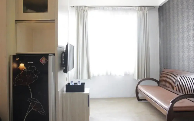 2Br Apartment with Pool View at the Jarrdin Cihampelas by Travelio