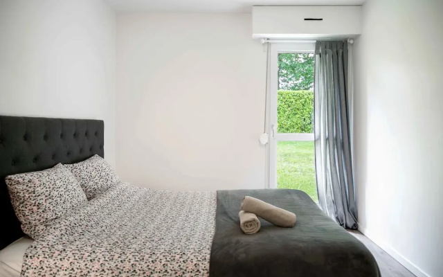 Chic Appartement avec Terrasse, Parking Privatif