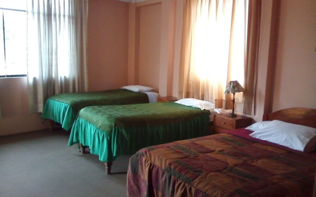 Hostal Tres Mascaras