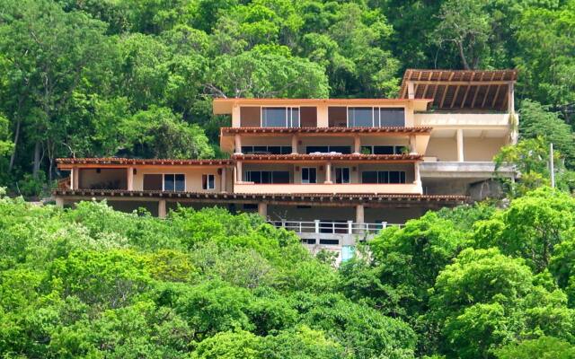 Отель La Escollera Suites вид на фасад