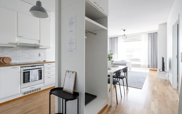 Top Floor 1BR Home with Parking, Sauna and Balcony