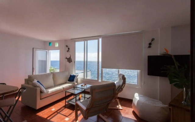 Canary casita next to the Atlantic Ocean