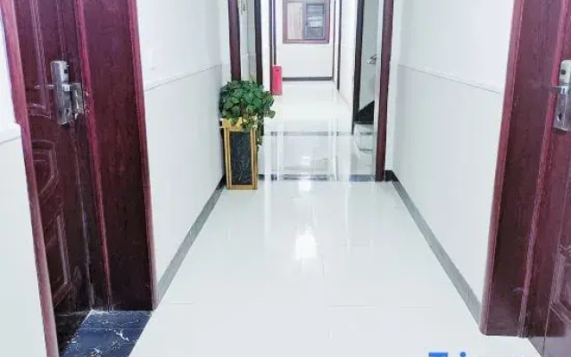 Zhoukou Kaixinyuan Hotel (Baicheng Railway Station)