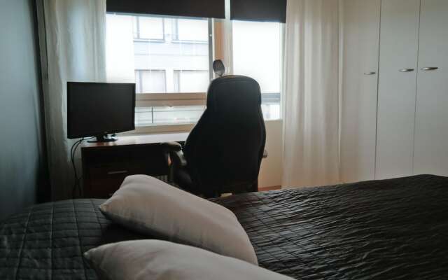 Апартаменты Local Nordic Apartments - Swan Ювяскюля комната для гостей