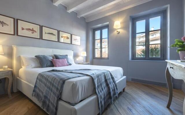 Отель Isola Bella Apartments - Via del Voltone Италия, Стреза - отзывы, цены и фото номеров - забронировать отель Isola Bella Apartments - Via del Voltone онлайн комната для гостей